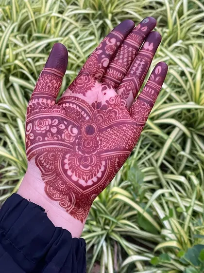 A beautiful stain photographed outdoors. Natural light really brings out the richness of the henna color.