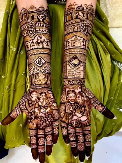 This design celebrates family with portraits of the couple and their parents. The arms are decorated with peacocks, elephants, and the couple's initials.