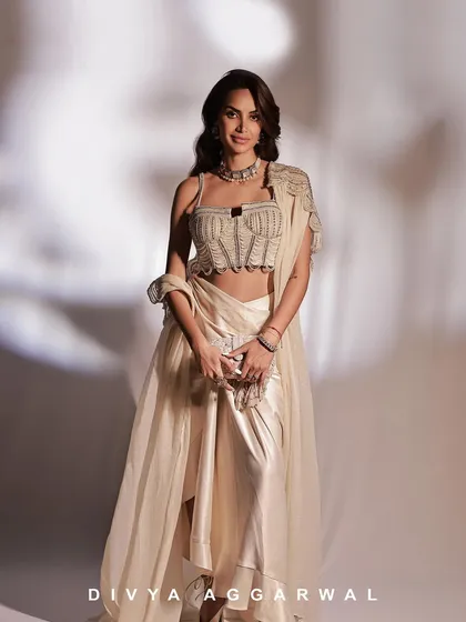 Diipa Buller Khosla looking radiant in the Alauren Set. This full-length view shows how the cape and draped skirt come together to create a truly unique silhouette.