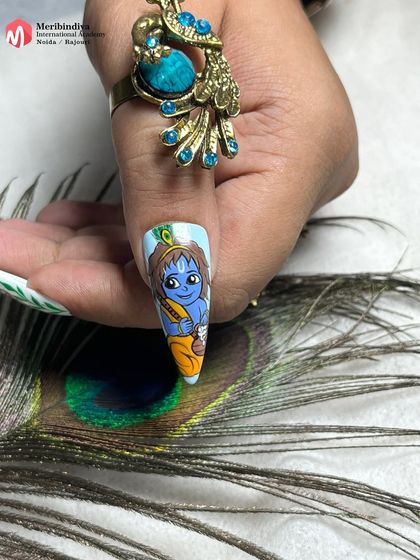 A close-up of the Bal Krishna nail from our Janmashtami set. You will learn how to paint detailed characters and expressions on a small canvas.