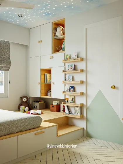 Designing kids' rooms is about sparking imagination. This room features a platform bed with built-in storage, a dedicated reading nook with accessible shelves, and a starry ceiling to make bedtime magical. Every element is designed to be safe, functional, and fun, creating a space where a child can grow and play.