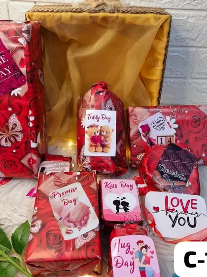 A Valentine's week celebration in a basket. This hamper includes individually wrapped gifts for each day of Valentine's week, from Rose Day to Promise Day.