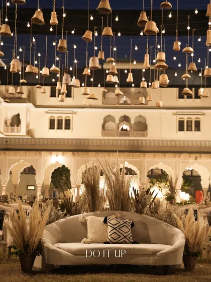 A bohemian-themed sangeet in Jaipur. I used natural textures like pampas grass and wicker lampshades, combined with soft lighting and a comfortable lounge setting, to create a relaxed yet stylish atmosphere for a night of celebration.