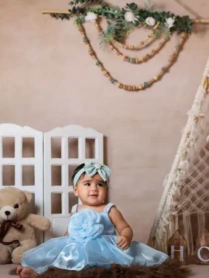 A full view of the "Boho Home" set, with a teepee, teddy bear, and white fence for a cozy feel.