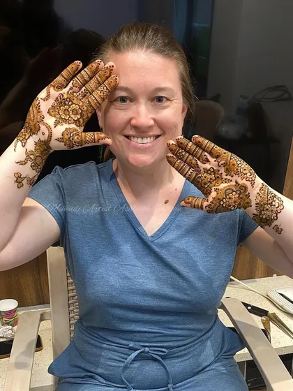 Another shot of my happy international client. Her enthusiasm for mehendi was infectious.
