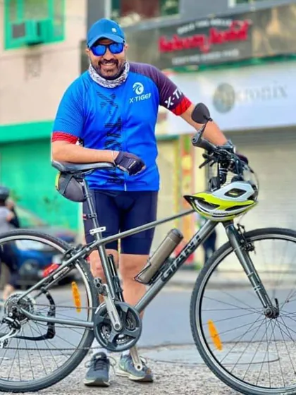 A member with his Giant bike. He is a cherished part of our cycling family.