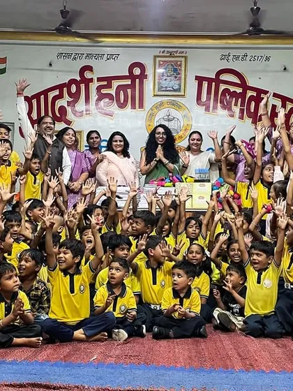 A group photo with all the wonderful children and teachers at the Adarsh Honey Public School in Indore. Their smiles are a memory I will cherish forever.