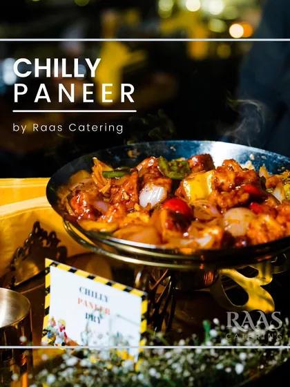 A classic Indo-Chinese favorite, my Chilly Paneer is cooked live with soft paneer cubes, crunchy onions, and bell peppers tossed in a tangy and spicy sauce. It's a perfect appetizer or side dish.