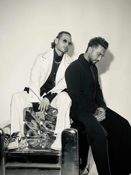 A quiet moment captured during the GQ shoot. The contrast of the black and white suits here speaks to the duality I often explore in my work: structure and fluidity, light and shadow.
