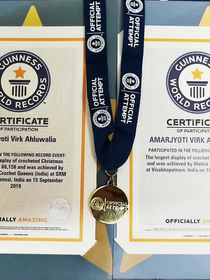 I am a proud multiple Guinness World Record holder for my participation in creating the largest displays of crochet items. This is a big part of my journey from a homemaker to a professional crochet artist.