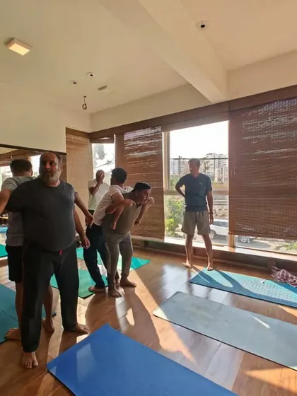 The studio is filled with energy and focus during our partner yoga sessions. It's a wonderful opportunity for students to connect and learn in a different way.