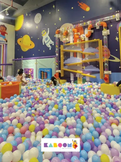 A galaxy of fun awaits in our space-themed play area, complete with a massive ball pit for an out-of-this-world experience.