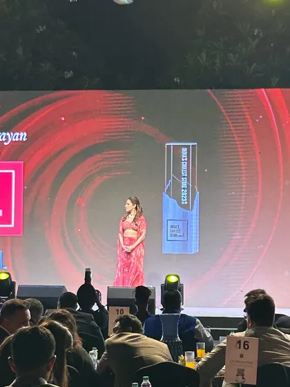 On stage at the Couture India show, with Nushrratt Bharuccha hosting. Performing at high-profile corporate events is a key part of what I do.