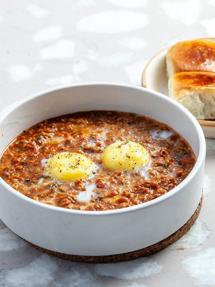 A weekend specialty, our Tawa Chicken Rara is topped with two baked eggs and served with soft Maska Buns. It's a rich and satisfying dish perfect for a leisurely meal, available for both dine-in and delivery.