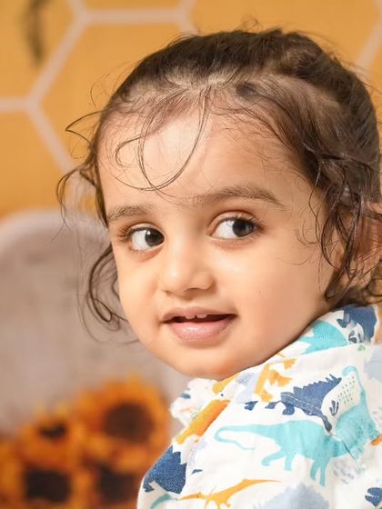 A collection of candid and playful moments from a sunflower-themed session, showing a range of expressions from curious to joyful.