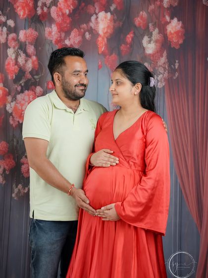 A beautiful look shared between partners during their studio maternity session. These are the candid, unposed feelings I love to capture.