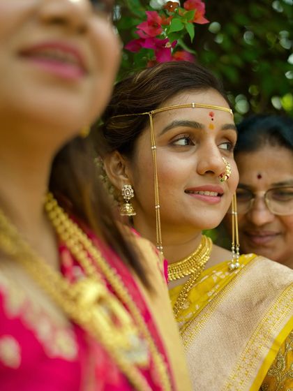 A bride surrounded by the important women in her life. This candid shot captures the love and support of her family and friends.