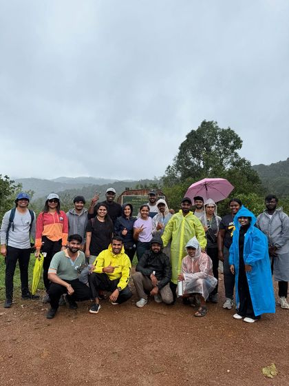 Our trekking group at the start of the Kurinjal trail inside Kudremukh National Park. Everyone is geared up with raincoats and ready for a misty, monsoon adventure.