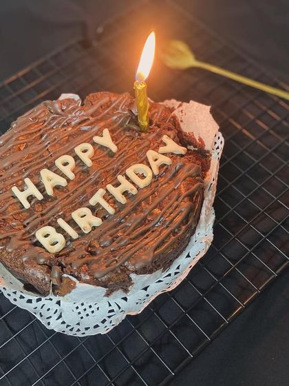 Our fudgy brownie cake, perfect for a simple and delicious birthday celebration.