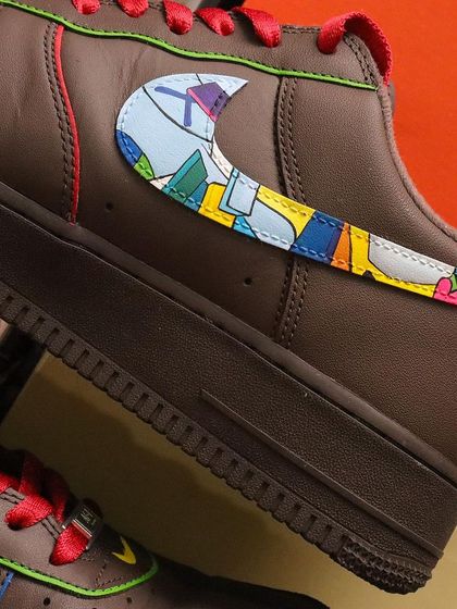 A close-up of the Kaws-inspired swoosh on the Scrooge McDuck sneakers. I filled the Nike logo with a colorful abstract pattern that is characteristic of the famous street artist's work.