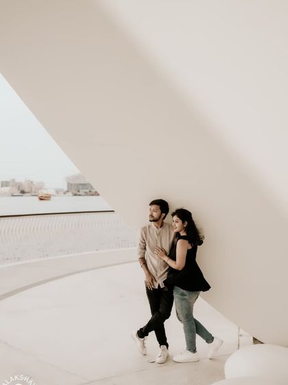 Using the unique architectural shapes to frame the couple in a modern and artistic way.