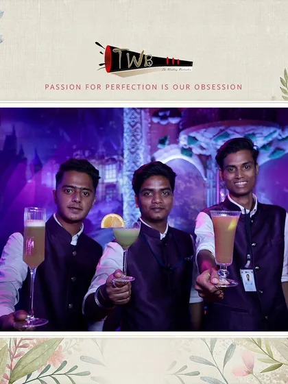 Three of our team members proudly present their mocktail creations, ready for a night of celebration.