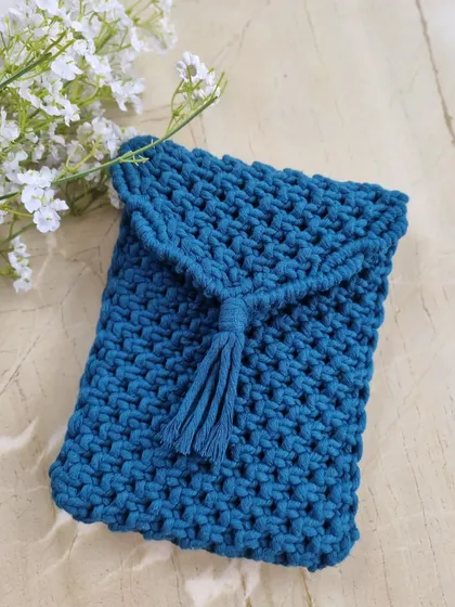 We even make accessories for your accessories. This handmade macrame sleeve was designed to perfectly fit and protect an iPad mini, combining boho chic with modern tech.