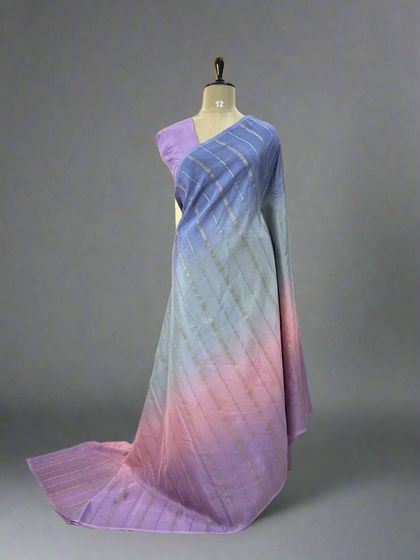 A subtle and elegant Rangkat pure Mysore silk saree with a gradient of purple, blue, and pink.