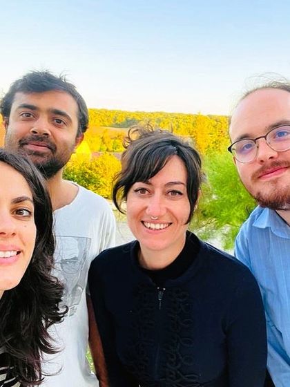 A candid selfie of our multicultural artists during a residency in the French countryside. These moments of connection and collaboration are where our creative ideas are born.
