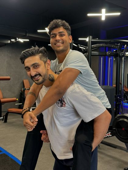 Tribe really be tribin'. The vibes are immaculate and the fam is getting stronger every day. Here's a coach giving a member a piggyback ride after a tough session.