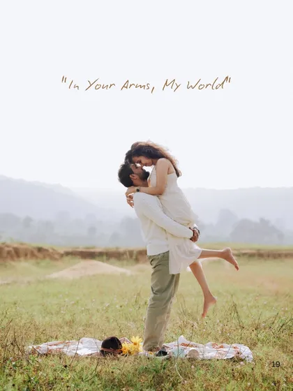Pure, unscripted joy. This playful lift in an open field captures the carefree spirit and deep affection between a couple, showing that the best moments are often the most spontaneous ones.