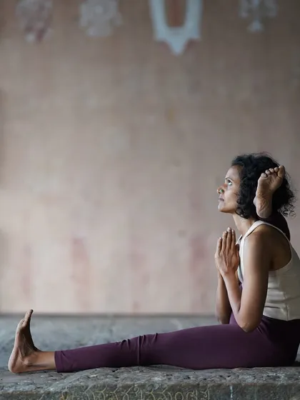 This seated posture, Eka Pada Sirsasana, requires patience and dedication. It teaches me that the journey of growth is not about a giant leap, but about the small, consistent steps we take each day on the mat.