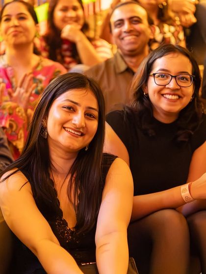 Two friends enjoying the music together. Our jams are the perfect place for a weekend outing with your favorite people.