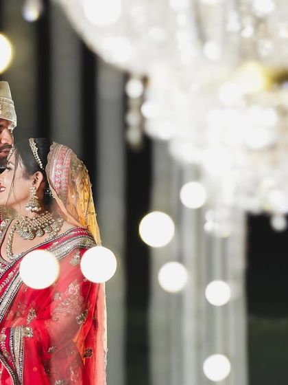 An intimate portrait of the couple amidst the dazzling lights of their reception. Every wedding we plan is a story, and we love being a part of it.