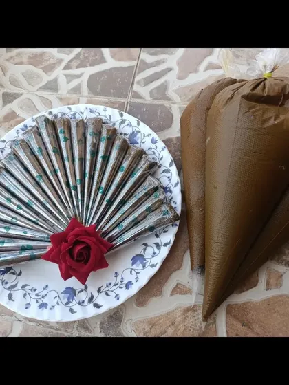 These are my fresh, homemade organic henna cones, ready to be shipped. I make them myself in small batches to ensure you get the best possible paste for a dark, long-lasting stain.