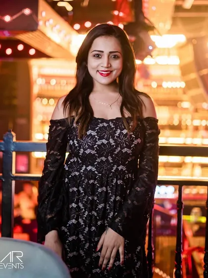 A guest posing on the balcony.