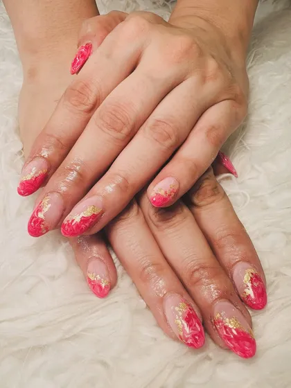 Abstract pink and gold foil nails that look like a work of art. This is a great way to wear glitter in a more organic, free-form style.