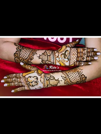 The full back-of-hand design, combining the penguin and ring motifs with elegant patterns that extend up the arm.