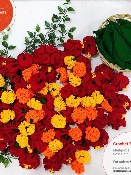 A beautiful flat lay of a large order of crochet flowers and leaves, ready to be packed and sent to a customer.