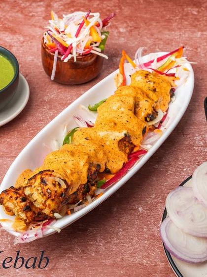 Our Thaina Kebab is exceptionally soft and flavourful. It's made with finely minced meat and a blend of spices that make it melt in your mouth.