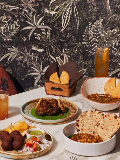 A festive spread perfect for any celebration. Our table is laden with crowd favourites like Haleem, Champaran Meat, and Green Chilly Prawns, ready to be shared.