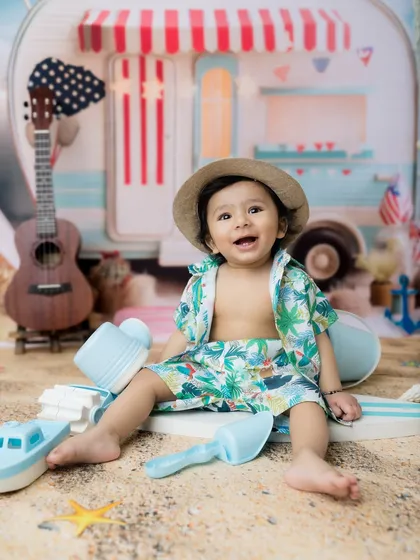 Beach days are the best days! This camper and beach-themed photoshoot is perfect for a summer baby.