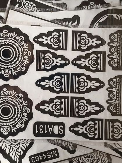 The mandala and finger detail stencils are some of my bestsellers. They help you achieve that classic henna look effortlessly.