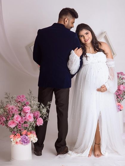 A sweet, candid-style shot from our bright and airy floral setup. Her smile says it all, pure happiness and love.
