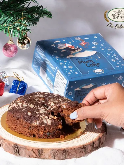 Our premium round plum cake, loaded with soaked fruits and nuts, is a Christmas essential. Perfect for sharing with family and friends during the festive season.