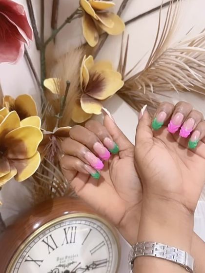 This angle showcases the sharp, clean lines of our modern French manicure, even with bright and unconventional colors.