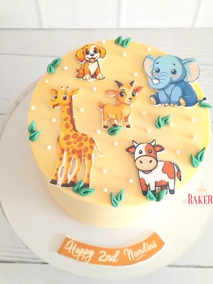A no-fondant jungle cake for Nandini's 2nd birthday, featuring all her favorite animals as cute, edible prints. And the best part? This was a completely gluten-free cake, so everyone could enjoy a slice.