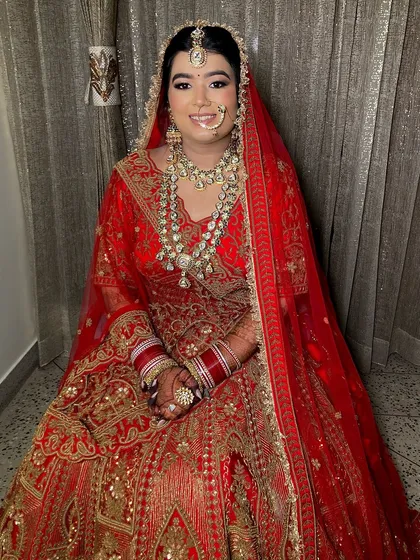 Sonakshi looked so glowing and ethereal. I loved dolling her up in this classic red lehenga, creating a look that was both traditional and radiant.