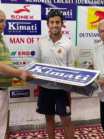 One of our players receiving the 'Man of the Match' award in a memorial cricket tournament. Individual accolades like these are a direct result of the discipline and skill development emphasized in our coaching camps.