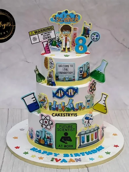 Spark curiosity with this unique three-tier "Future Scientist" cake. Perfect for a budding genius, it's covered in fun, edible science elements like beakers, DNA strands, atoms, and a microscope, making learning delicious.